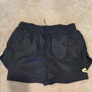 Nike Black Athletic Shorts with Elastic Waistband and Lightweight Material